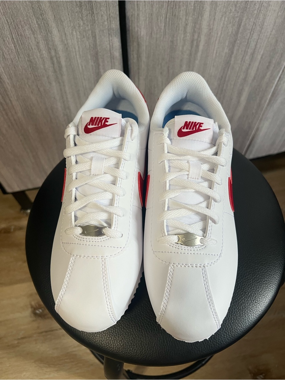Nike White Sneakers with Red Swoosh